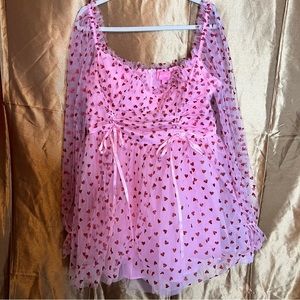 Pink dress/red hearts.